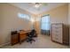 Home office with built-in desk and plenty of natural light at 2003 Acadia Greens Dr, Sun City Center, FL 33573
