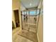 Spacious shower with tile surround and built-in seat at 6625 Pebblebrooke Way, Zephyrhills, FL 33541