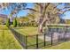 Fenced dog park with waste disposal station at 11728 Cambium Crown Dr, Riverview, FL 33569