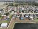 House with solar panels and lake view at 14319 Italia Dr, Wimauma, FL 33598