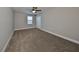 Spacious bedroom with ceiling fan and double-door closet at 14319 Italia Dr, Wimauma, FL 33598