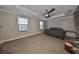 Primary bedroom with high ceilings and ceiling fan at 14319 Italia Dr, Wimauma, FL 33598