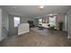 Spacious bonus room with plush carpet, large windows, and plenty of natural light at 14319 Italia Dr, Wimauma, FL 33598