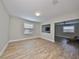 Spacious game room with tile floors and plenty of natural light at 14319 Italia Dr, Wimauma, FL 33598
