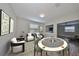 Game room with poker table, comfortable seating, and modern decor at 14319 Italia Dr, Wimauma, FL 33598
