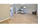 Bright and airy home office with wood-look floors and modern workspace at 14319 Italia Dr, Wimauma, FL 33598