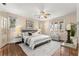 Spacious bedroom with hardwood floors and ample natural light at 2311 Brevard Ne Rd, St Petersburg, FL 33704