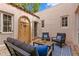 Inviting courtyard with seating area, fountain, and tile flooring at 2311 Brevard Ne Rd, St Petersburg, FL 33704