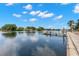 Serene waterfront view with a dock at 2311 Brevard Ne Rd, St Petersburg, FL 33704