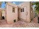Home's exterior showcasing a side view and brick pathway at 2311 Brevard Ne Rd, St Petersburg, FL 33704