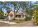 Side view of Spanish style home showcasing unique architecture at 2311 Brevard Ne Rd, St Petersburg, FL 33704