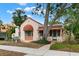 Charming Spanish style home with terracotta roof and lush landscaping at 2311 Brevard Ne Rd, St Petersburg, FL 33704