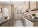 Bright kitchen featuring tile floors and updated cabinets at 2311 Brevard Ne Rd, St Petersburg, FL 33704