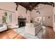 Living room with fireplace and access to courtyard at 2311 Brevard Ne Rd, St Petersburg, FL 33704