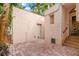 Brick paved patio area with exterior storage at 2311 Brevard Ne Rd, St Petersburg, FL 33704