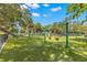 Park playground with swings and play structure at 2311 Brevard Ne Rd, St Petersburg, FL 33704