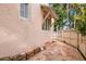 Brick paved side yard with a wooden fence at 2311 Brevard Ne Rd, St Petersburg, FL 33704