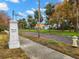 Granada Terrace street view with mature trees and homes at 2311 Brevard Ne Rd, St Petersburg, FL 33704