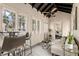 Relaxing sunroom with comfortable seating and access to patio at 2311 Brevard Ne Rd, St Petersburg, FL 33704