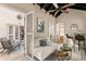 Sunroom features a cozy seating area and views of the backyard at 2311 Brevard Ne Rd, St Petersburg, FL 33704
