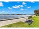 Relaxing waterfront park bench with scenic views at 2311 Brevard Ne Rd, St Petersburg, FL 33704