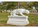 White panther statue adorns the front yard at 2311 Brevard Ne Rd, St Petersburg, FL 33704
