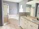 Bathroom with double vanity, soaking tub, and shower at 6554 Gentle Ben Cir, Wesley Chapel, FL 33544