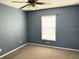 Spacious bedroom with neutral walls and carpet at 6554 Gentle Ben Cir, Wesley Chapel, FL 33544