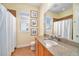 Guest bathroom with granite countertop and shower/tub combo at 8478 Dunham Station Dr, Tampa, FL 33647