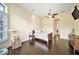 Bright bedroom with hardwood floors and ensuite bathroom access at 8478 Dunham Station Dr, Tampa, FL 33647