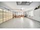 Spacious garage with epoxy flooring and ample storage at 8478 Dunham Station Dr, Tampa, FL 33647