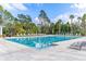 Inviting resort-style pool with ample lounge chairs at 8478 Dunham Station Dr, Tampa, FL 33647