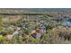 Aerial view showing a single-Gathering home's location within a residential community at 18214 Stillwell Ln, Tampa, FL 33647