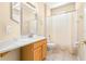 Bathroom with single vanity and shower/tub combo at 18214 Stillwell Ln, Tampa, FL 33647