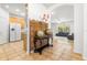 Entryway with a view of the living room and kitchen at 18214 Stillwell Ln, Tampa, FL 33647