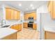 Modern kitchen with stainless steel appliances and white countertops at 18214 Stillwell Ln, Tampa, FL 33647