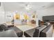 Open concept living room, kitchen, and dining area at 18214 Stillwell Ln, Tampa, FL 33647