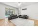 Living room with sliding doors to pool and patio at 18214 Stillwell Ln, Tampa, FL 33647