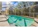Spacious screened pool with sun-drenched patio at 18214 Stillwell Ln, Tampa, FL 33647