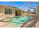 Large screened in pool and patio area at 18214 Stillwell Ln, Tampa, FL 33647