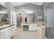 Main bathroom with a large soaking tub, shower, and double vanity at 22247 Red Jacket Ln, Land O Lakes, FL 34639