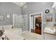 Bathroom features a walk-in shower, soaking tub, and double sink vanity at 22247 Red Jacket Ln, Land O Lakes, FL 34639