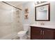 Clean bathroom with a shower, toilet and modern vanity at 22247 Red Jacket Ln, Land O Lakes, FL 34639