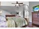 Main bedroom with large dresser and view of hallway at 22247 Red Jacket Ln, Land O Lakes, FL 34639
