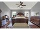 Spacious main bedroom with wood flooring and plenty of natural light at 22247 Red Jacket Ln, Land O Lakes, FL 34639
