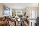 Bright living room featuring hardwood floors, comfy sofas, and a coffee table at 22247 Red Jacket Ln, Land O Lakes, FL 34639