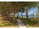 Landscaped walkway with benches offering waterfront views at 3128 59Th S St # 215, Gulfport, FL 33707