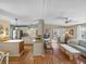 Open concept kitchen with stainless steel appliances and light-colored cabinetry at 3907 William Hume Dr, Zephyrhills, FL 33541