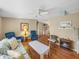 Open concept living area with hardwood floors at 3907 William Hume Dr, Zephyrhills, FL 33541