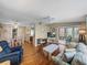 Bright living room with hardwood floors and fireplace at 3907 William Hume Dr, Zephyrhills, FL 33541
